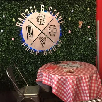 Barrel & Stave logo wall and table